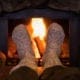 Kevin Robinson's Heating & Cooling | Lancaster, Kershaw, Lugoff, Camden, Indian Land, Heath Springs, SC | Feet in wool socks near fireplace